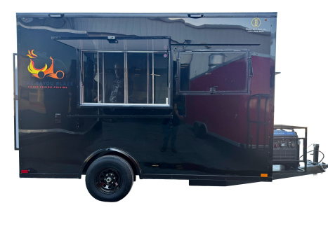 Side view of a black food trailer with a serving window and counter