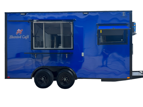 Side view of a blue cafe trailer with a serving window and service counter