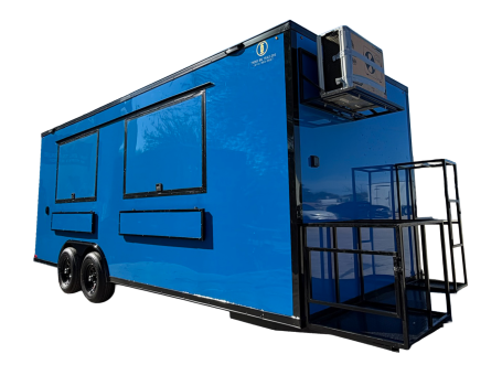 Blue food trailer with closed window awnings and a front equipment rack