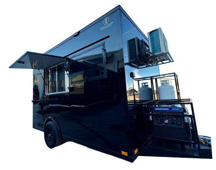 Black food trailer with a serving window, generator and propane tanks