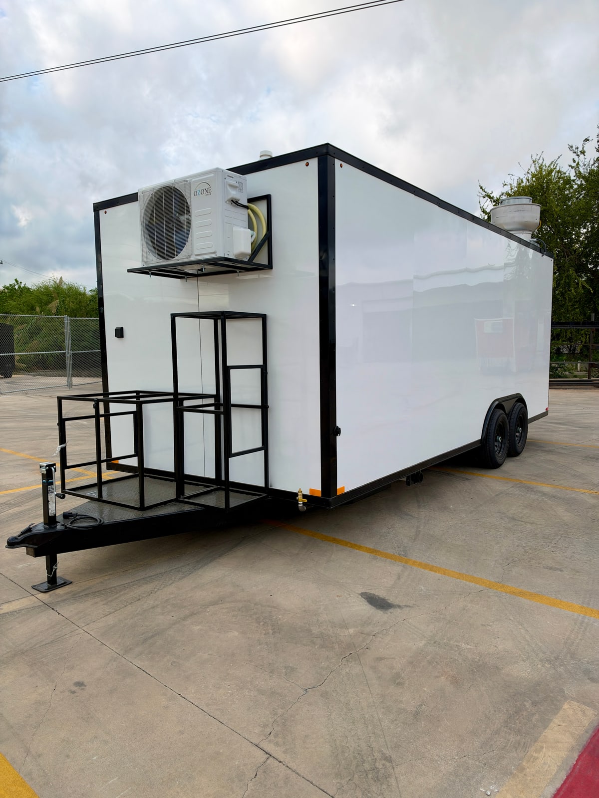 White 8.5 × 20 ft trailer — Front and side exterior