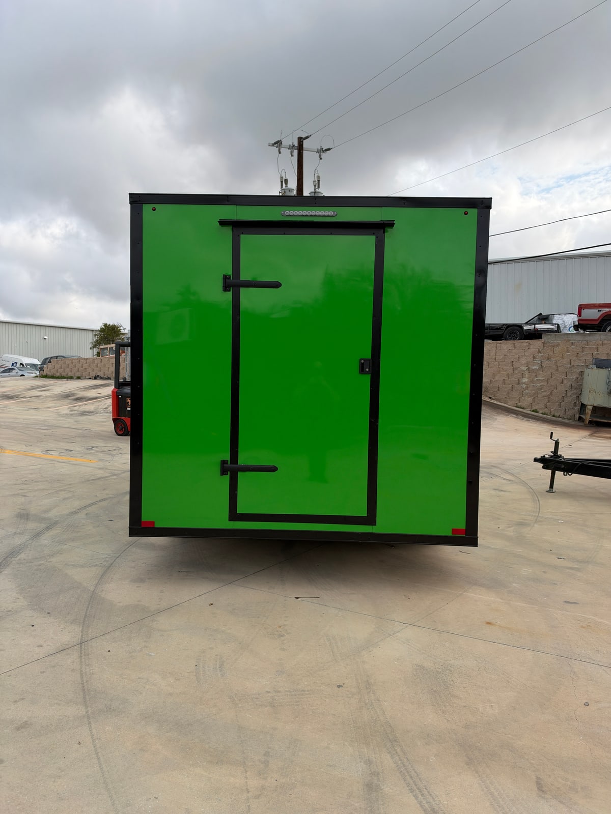 Green 8.5 × 16 ft trailer — Rear entry door